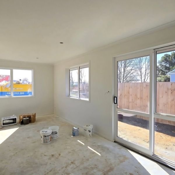 Painter cutting in around trim